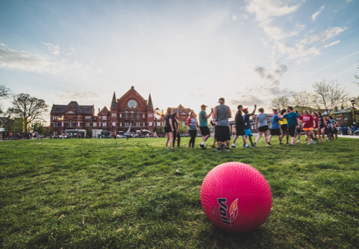 young adults playing kickball in Washington Park