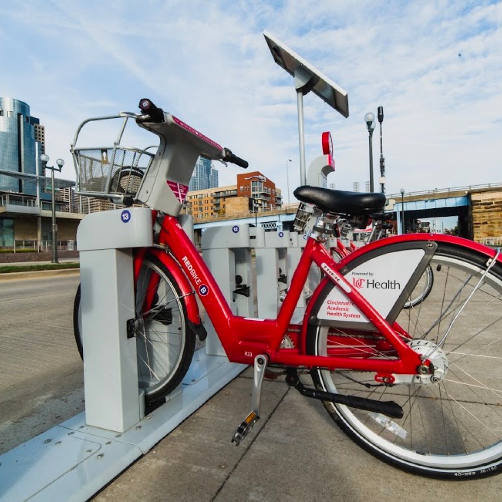 Cincinnati red bike is way to get around town leading to a low-cost of living in cincinanti