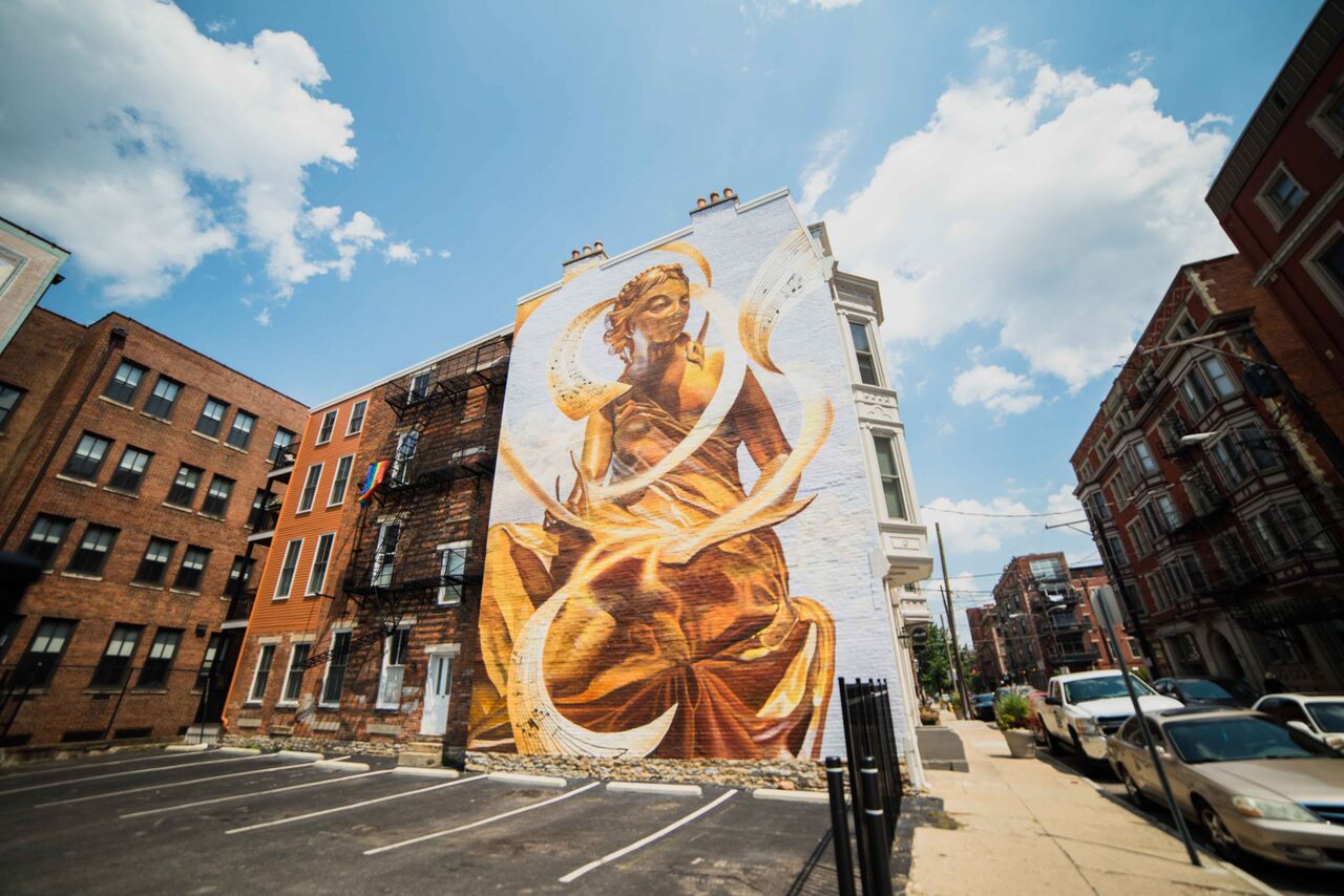 spend a weekend in cincinnati explore the many murals on a tour