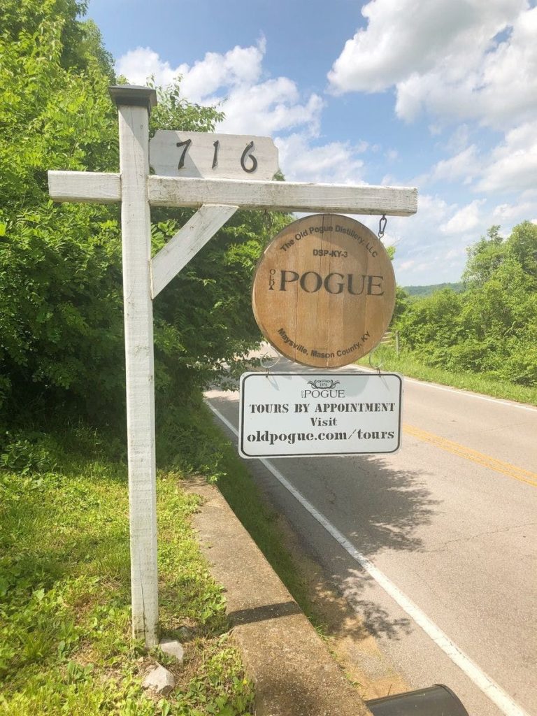 roadside sign for Old Progue distillery