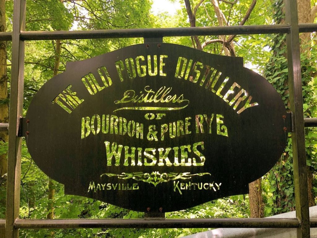metal sign for The Old Pogue Distillery