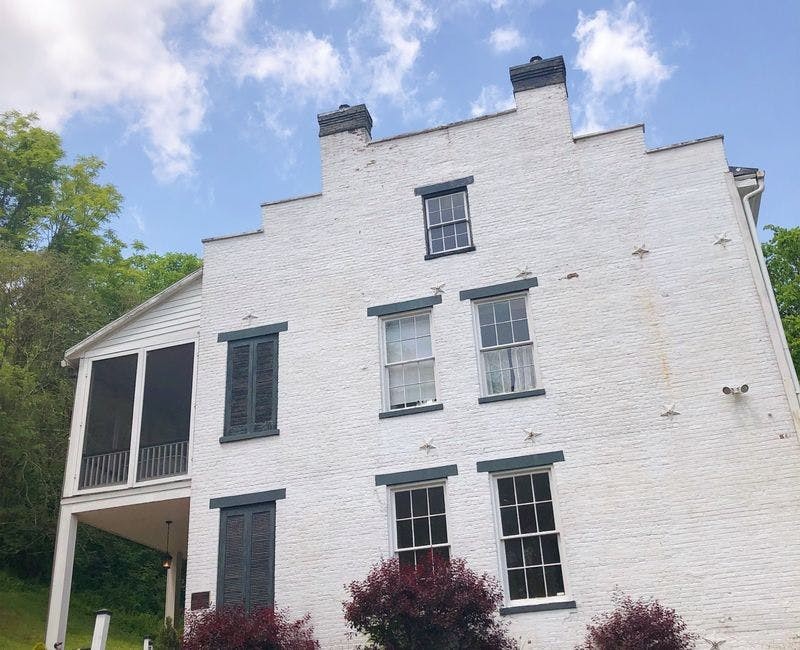 an old white brick building