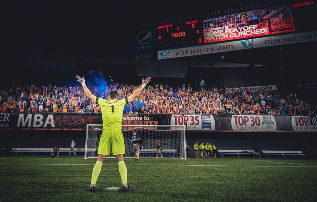 FC Cincinnati player in front of the crowd in soccer city usa