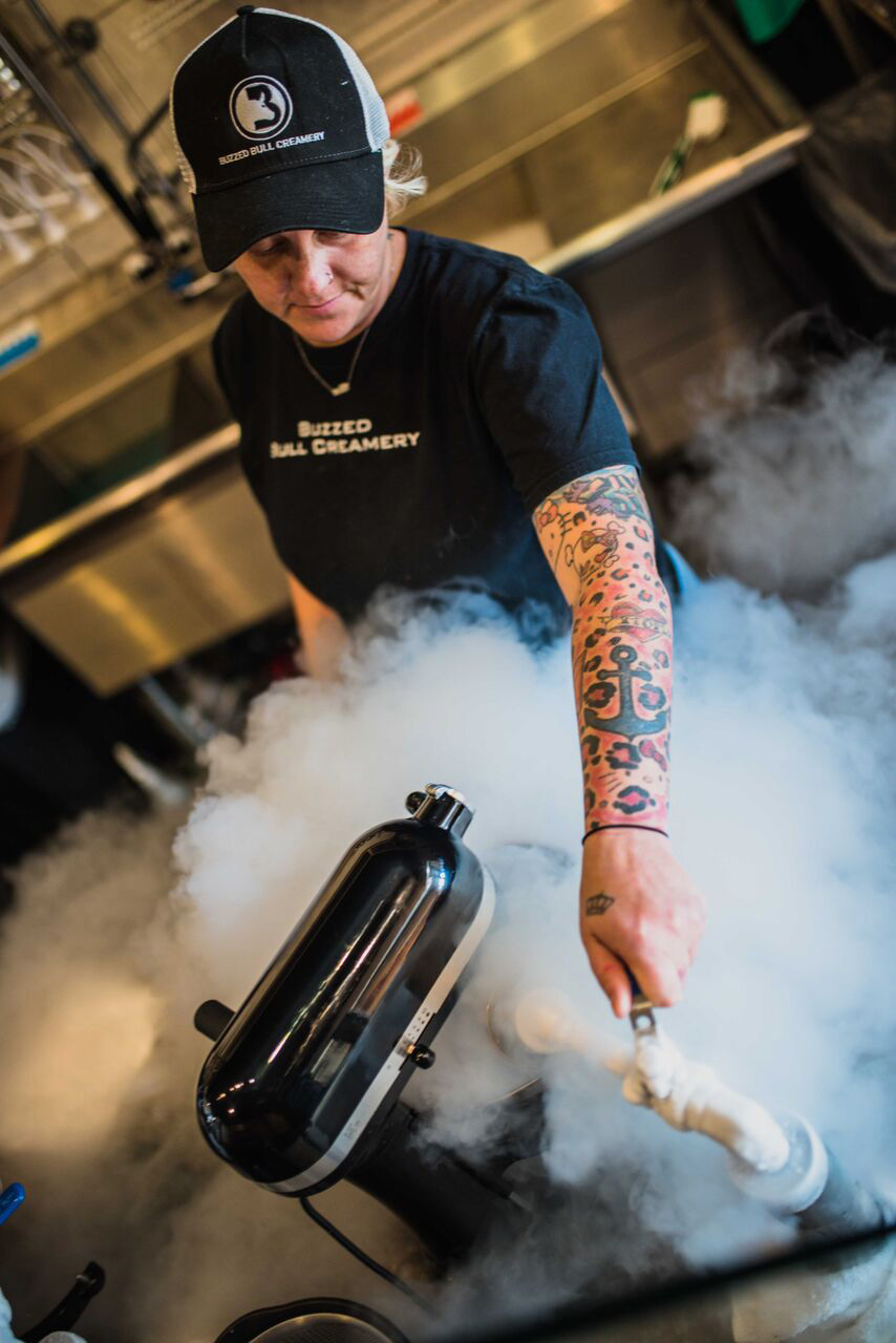 Buzzed Bull Creamery worker making ice cream