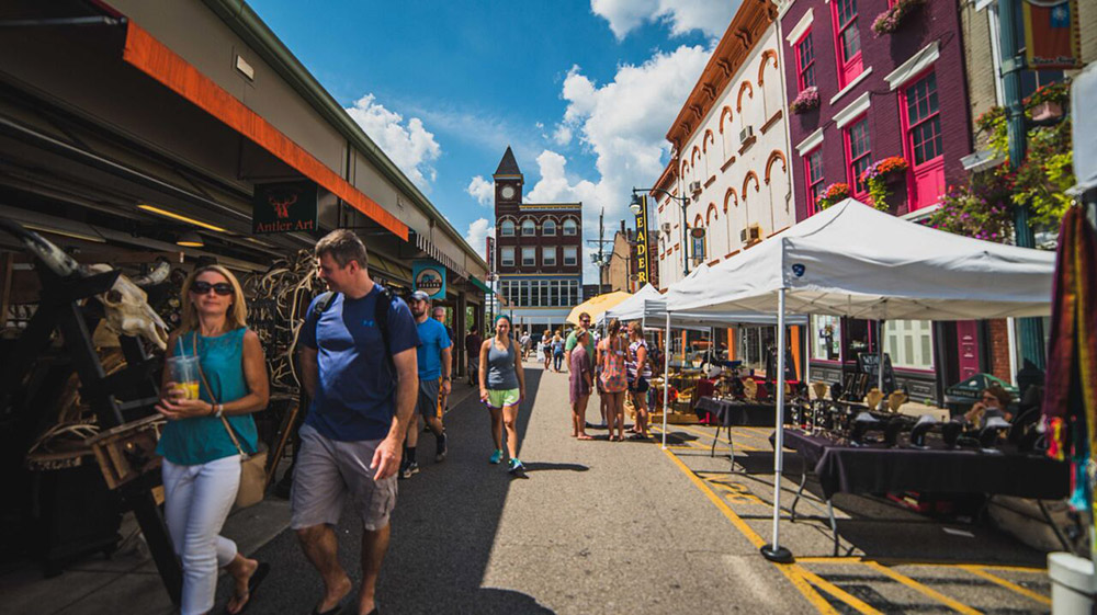 people enjoying findlay market, an outdoor market in Over-The-Rhine