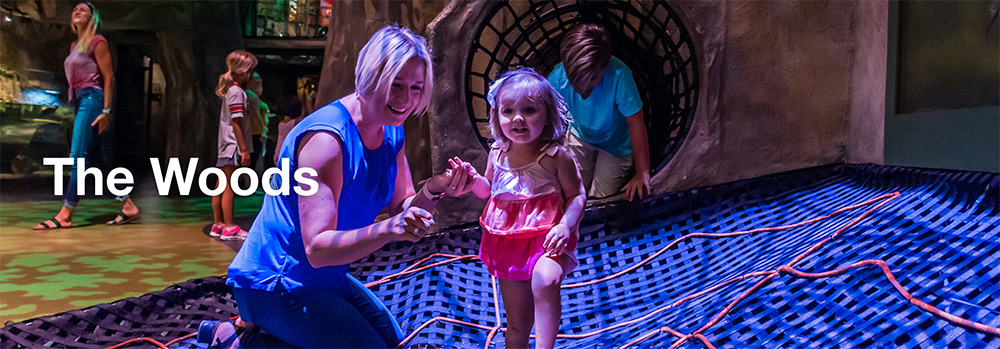 woman and child playing at Duke Energy's Children's Museum exhibit